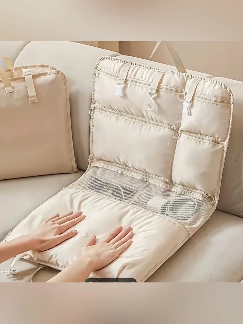 Beige Hanging Organizer with Multiple Pockets and Hooks